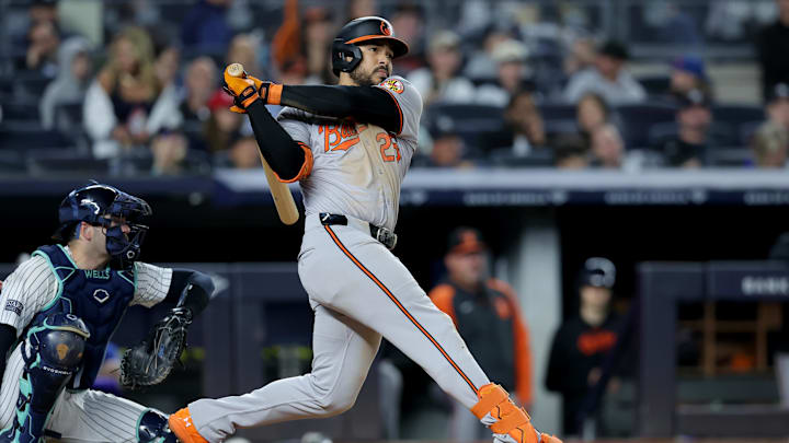 Sep 25, 2024; Bronx, New York, USA; Baltimore Orioles right fielder Anthony Santander (25) follows through on an RBI double against the New York Yankees during the fourth inning at Yankee Stadium.