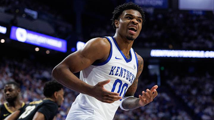 Feb 28, 2026; Lexington, Kentucky, USA; Kentucky Wildcats guard Otega Oweh (00) reacts towards a referee after a play at the basket during the second half against the Vanderbilt Commodores at Rupp Arena at Central Bank Center. Mandatory Credit: Jordan Prather-Imagn Images