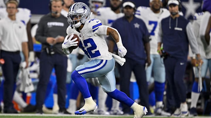 Dallas Cowboys running back Deuce Vaughn runs with the ball.