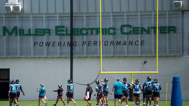 Jacksonville Jaguars offensive players walk to their next station during the fourth organized team activity at the Miller Electric Center in Jacksonville, Fla. Tuesday, May 27, 2025. [Doug Engle/Florida Times-Union]