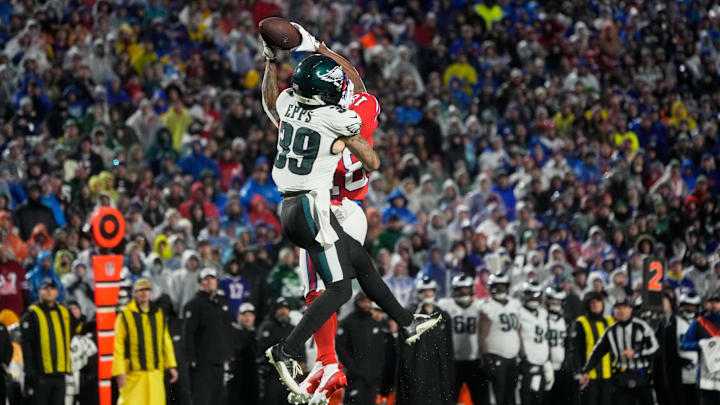 Dec 28, 2025; Orchard Park, New York, USA; Buffalo Bills wide receiver Brandin Cooks (18) (obscured) leaps to catch a pass against Philadelphia Eagles safety Marcus Epps (39) during the fourth quarter at Highmark Stadium Dec 28, 2025; Orchard Park, New York, USA; Buffalo Bills wide receiver Brandin Cooks (18) (obscured) leaps to catch a pass against Philadelphia Eagles safety Marcus Epps (39) during the fourth quarter at Highmark Stadium