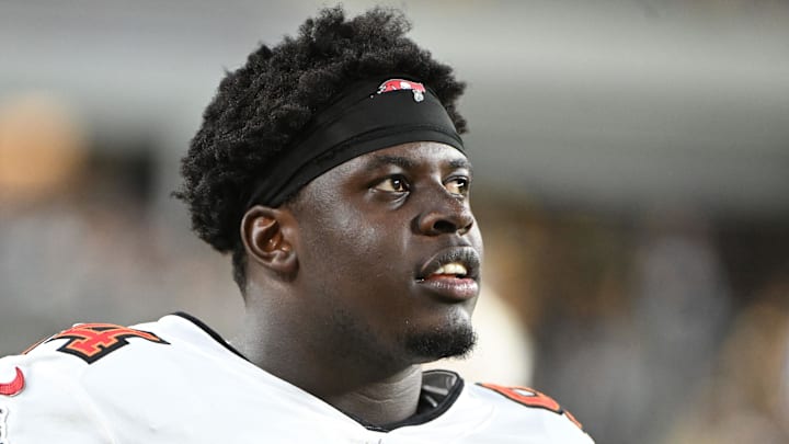 Aug 16, 2025; Pittsburgh, Pennsylvania, USA; Tampa Bay Buccaneers defensive tackle Calijah Kancey (94) watches the action against the  Pittsburgh Steelers during the second half at Acrisure Stadium. Mandatory Credit: Barry Reeger-Imagn Images
