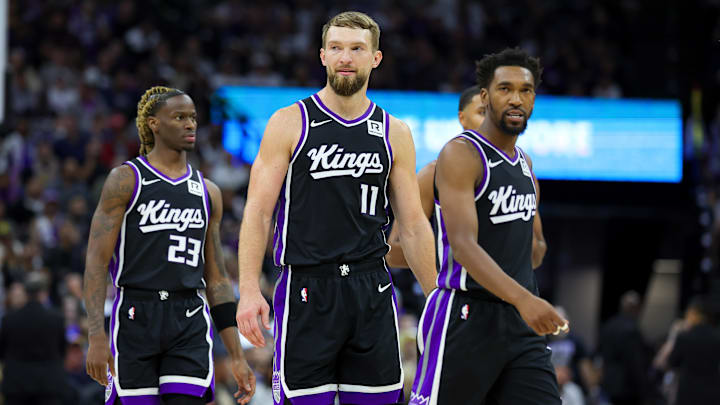 Oct 24, 2024; Sacramento, California, USA; Sacramento Kings forward Domantas Sabonis (11) and guard Malik Monk (0) walk up the court against the Minnesota Timberwolves during the fourth quarter at Golden 1 Center. Mandatory Credit: Sergio Estrada-Imagn Images