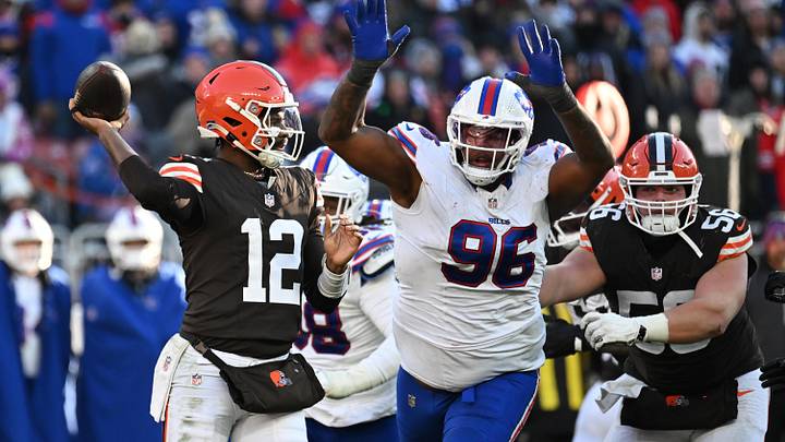Dec 21, 2025; Cleveland, Ohio, USA;  Buffalo Bills defensive tackle Deone Walker (96)v applies pressure on Cleveland Browns quarterback Shedeur Sanders (12) during the second half at Huntington Bank Field. Mandatory Credit: Ken Blaze-Imagn Images