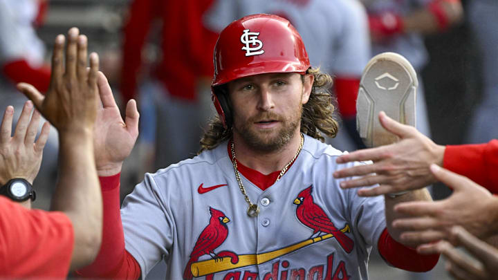 Jun 17, 2025; Chicago, Illinois, USA;  St. Louis Cardinals second baseman Brendan Donovan (33) celebrates in the dugout after he scores during the second inning against the Chicago White Sox at Rate Field. Mandatory Credit: Matt Marton-Imagn Images