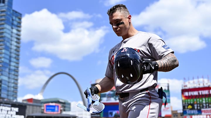 May 19, 2024; St. Louis, Missouri, USA;  Boston Red Sox designated hitter Tyler O'Neill (17) walks off the field after flying out against the St. Louis Cardinals during the ninth inning at Busch Stadium. Mandatory Credit: Jeff Curry-Imagn Images