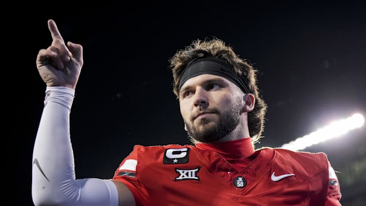 Cincinnati, Ohio, USA;  Cincinnati Bearcats quarterback Brendan Sorsby points to fans as he walks off the field after defeating the Baylor Bears at Nippert Stadium. 
