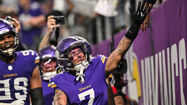 Nov 3, 2024; Minneapolis, Minnesota, USA; Minnesota Vikings cornerback Byron Murphy Jr. (7) reacts with the crowd after an interception off Indianapolis Colts quarterback Joe Flacco (not pictured) during the third quarter at U.S. Bank Stadium.