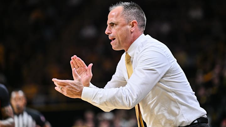 Iowa Hawkeyes head coach Ben McCollum