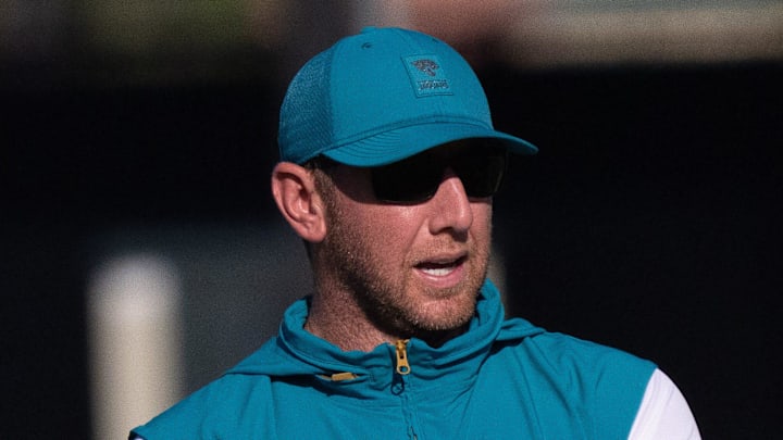 Jacksonville Jaguars Head Coach Liam Coen, left, talks with Assistant Strength and Conditioning Coach Julian Whitehead during the Jacksonville Jaguars’ 18th and final training camp practice at Miller Electric Center in Jacksonville, Fla. Wednesday August 20, 2025. [Doug Engle/Florida Times-Union]