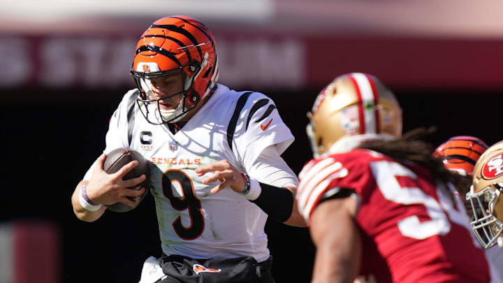 October 29, 2023; Santa Clara, California, USA; Cincinnati Bengals quarterback Joe Burrow (9) is tackled by San Francisco 49ers defensive end Nick Bosa (97) during the second quarter at Levi's Stadium. Mandatory Credit: Kyle Terada-Imagn Images