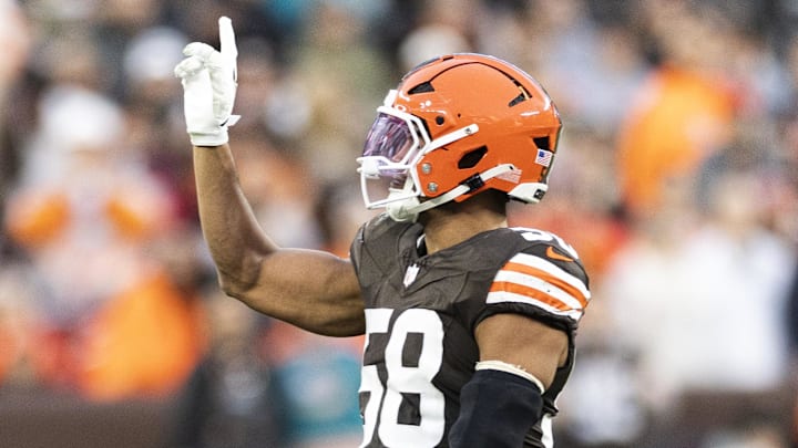 Dec 29, 2024; Cleveland, Ohio, USA; Cleveland Browns linebacker Jordan Hicks (58) celebrates his tackle for a loss against the Miami Dolphins during the second quarter at Huntington Bank Field. Mandatory Credit: Scott Galvin-Imagn Images