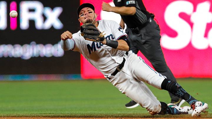 Miami Marlins shortstop Miguel Rojas (11) attempts to throw to first base. Credit: Sam Navarro-USA TODAY Sports Miami Marlins shortstop Miguel Rojas (11) attempts to throw to first base. Credit: Sam Navarro-USA TODAY Sports