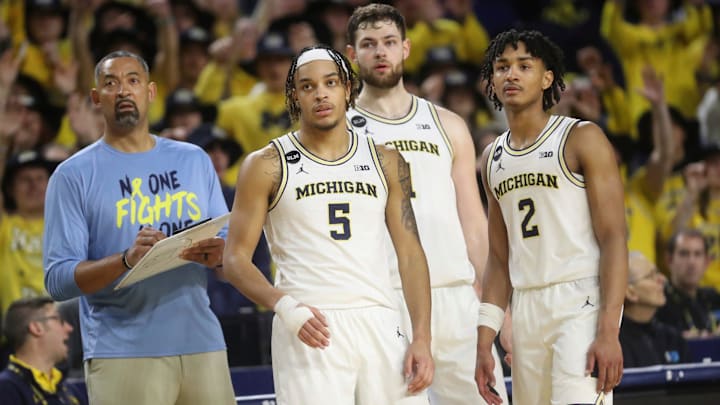 (From left) Michigan coach Juwan Howard, forward Terrance Williams II, center Hunter Dickinson and guard Kobe Bufkin look on during U-M's 60-56 win on Sunday, Jan. 22, 2023, at Crisler Center.

Mich Minn 012223 Kd 1938