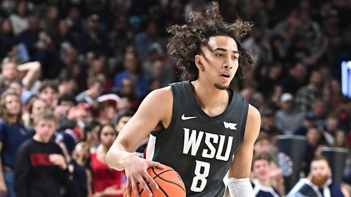 Jan 11, 2025; Spokane, Washington, USA; Washington State Cougars guard Nate Calmese (8) controls the ball against the Gonzaga Bulldogs in the second half at McCarthey Athletic Center. Mandatory Credit: James Snook-Imagn Images Jan 11, 2025; Spokane, Washington, USA; Washington State Cougars guard Nate Calmese (8) controls the ball against the Gonzaga Bulldogs in the second half at McCarthey Athletic Center. Mandatory Credit: James Snook-Imagn Images