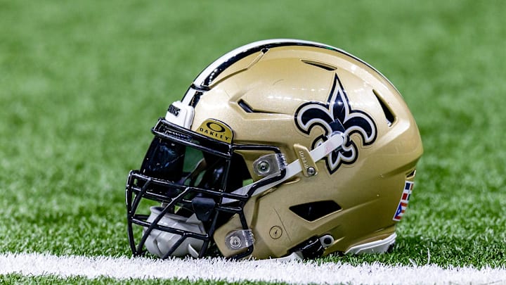 Jan 7, 2024; New Orleans, Louisiana, USA; Detailed view of the New Orleans Saints helmet during warmups against the Atlanta Falcons at Caesars Superdome. Mandatory Credit: Stephen Lew-Imagn Images