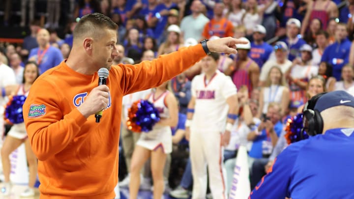 New Gator head football coach Jon Sumrall fires up the crowd during the first half an NCAA basketball game at Steven C. O'Connell Center Exactek arena in Gainesville, FL on Saturday, January 24, 2026. Auburn won 76-67 [Alan Youngblood/Gainesville Sun]