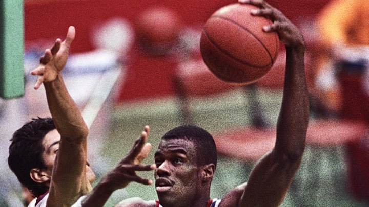 Sep 26, 1988; Seoul, SOUTH KOREA; FILE PHOTO; David Robinson (USA) (15) in action against Jose Rafael Ortiz (PUR) (4) during the men's basketball tournament at the 1988 Seoul Olympic Games at Jamsil Gymnasium. Mandatory Credit: Bob Deutsch-USA TODAY NETWORK