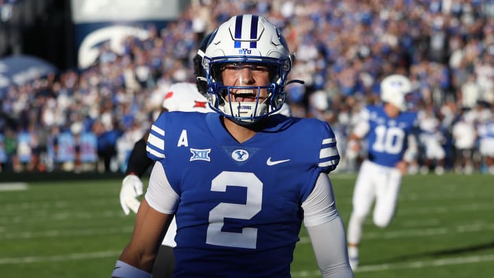 Oct 21, 2023; Provo, Utah, USA; Brigham Young Cougars wide receiver Chase Roberts (2) reacts to scoring a touchdown against the Texas Tech Red Raiders in the first quarter at LaVell Edwards Stadium.
