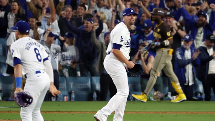 Oct 11, 2024; Los Angeles, California, USA; Los Angeles Dodgers pitcher Blake Treinen (49) celebrates after defeating the San Diego Padres during game five of the NLDS for the 2024 MLB Playoffs at Dodger Stadium. Mandatory Credit: Kiyoshi Mio-Imagn Images Oct 11, 2024; Los Angeles, California, USA; Los Angeles Dodgers pitcher Blake Treinen (49) celebrates after defeating the San Diego Padres during game five of the NLDS for the 2024 MLB Playoffs at Dodger Stadium. Mandatory Credit: Kiyoshi Mio-Imagn Images