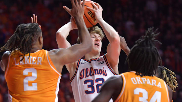 Dec 14, 2024; Champaign, Illinois, USA;  Tennessee Volunteers guard Chaz Lanier (2) and teammate Felix Okpara (34) guard Illinois Fighting Illini guard Kasparas Jakucionis (32) with the ball during the first half at State Farm Center. Mandatory Credit: Ron Johnson-Imagn Images