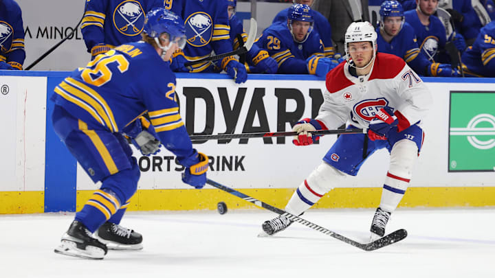 May 6, 2026; Buffalo, New York, USA; Buffalo Sabres defenseman Rasmus Dahlin (26) tries to knock down a pass by Montréal Canadiens center Jake Evans (71) during the first period in game one of the second round of the 2026 Stanley Cup Playoffs at KeyBank Center. Mandatory Credit: Timothy T. Ludwig-Imagn Images
