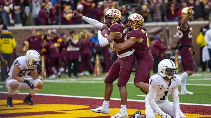 Nov 9, 2019; Minneapolis, MN, USA; Minnesota Golden Gophers defensive back Jordan Howden (23) celebrates with defensive back Antoine Winfield Jr. (11) after intercepting a pass to defeat the Penn State Nittany Lions at TCF Bank Stadium. Mandatory Credit: Jesse Johnson-Imagn Images Nov 9, 2019; Minneapolis, MN, USA; Minnesota Golden Gophers defensive back Jordan Howden (23) celebrates with defensive back Antoine Winfield Jr. (11) after intercepting a pass to defeat the Penn State Nittany Lions at TCF Bank Stadium. Mandatory Credit: Jesse Johnson-Imagn Images