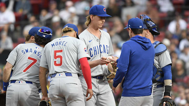 Apr 27, 2024; Boston, Massachusetts, USA; Chicago Cubs manager Craig Counsell takes the ball from