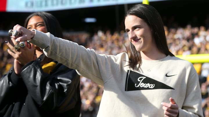Iowa women’s basketball’s Caitlin Clark shows off her rings during a second quarter timeout during Iowa football’s game against Northwestern Saturday, Oct. 26, 2024 at Kinnick Stadium in Iowa City, Iowa. Iowa women’s basketball’s Caitlin Clark shows off her rings during a second quarter timeout during Iowa football’s game against Northwestern Saturday, Oct. 26, 2024 at Kinnick Stadium in Iowa City, Iowa.