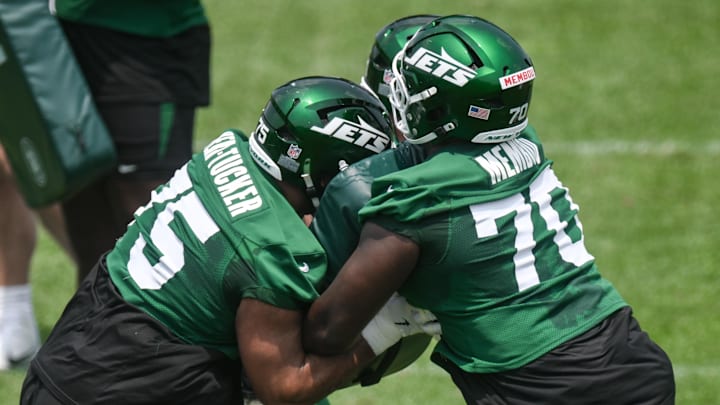 Jun 11, 2025; Florham Park, NY, USA; New York Jets offensive tackle Armand Membou (70) blocks against guard Alijah Vera-Tucker (75) and center Josh Myers (71) during minicamp at Atlantic Health Jets Training Center. Mandatory Credit: John Jones-Imagn Images