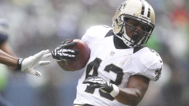 Jan 11, 2014; Seattle, WA, USA; New Orleans Saints running back Darren Sproles (43) runs the football against the Seattle Seahawks during the first half of the 2013 NFC divisional playoff football game at CenturyLink Field. Mandatory Credit: Joe Nicholson-Imagn Images