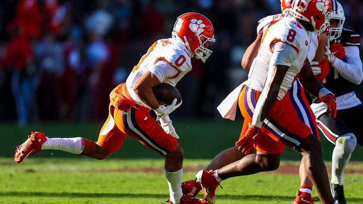 Nov 29, 2025; Columbia, South Carolina, USA; Clemson Tigers wide receiver Antonio Williams (0) makes yardage against the South Carolina Gamecocks in the second quarter at Williams-Brice Stadium. Mandatory Credit: Jeff Blake-Imagn Images Nov 29, 2025; Columbia, South Carolina, USA; Clemson Tigers wide receiver Antonio Williams (0) makes yardage against the South Carolina Gamecocks in the second quarter at Williams-Brice Stadium. Mandatory Credit: Jeff Blake-Imagn Images