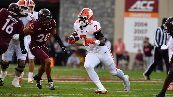 Nov 9, 2024; Blacksburg, Virginia, USA;  Clemson Tigers running back Phil Mafah (7) runs the ball against the Virginia Tech Hokies during the first quarter at Lane Stadium.
