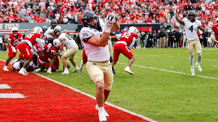 Oct 10, 2026; Raleigh, North Carolina, USA; Wake Forest Demon Deacons tight end Matthew Lusardi (48) catches the football for a touchdown during the first half of the game against NC State Wolfpack at Carter-Finley Stadium. Mandatory Credit: Jaylynn Nash-Imagn Images Oct 10, 2026; Raleigh, North Carolina, USA; Wake Forest Demon Deacons tight end Matthew Lusardi (48) catches the football for a touchdown during the first half of the game against NC State Wolfpack at Carter-Finley Stadium. Mandatory Credit: Jaylynn Nash-Imagn Images