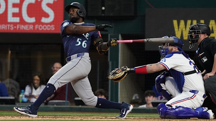 Seattle Mariners outfielder Randy Arozarena hits a single during game against the Texas Rangers on May 3 at Globe Life Field. Seattle Mariners outfielder Randy Arozarena hits a single during game against the Texas Rangers on May 3 at Globe Life Field.