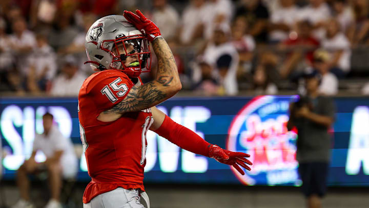 Aug 31, 2024; Tucson, Arizona, USA; New Mexico wide receiver Luke Wysong (15) celebrates touchdown during first quarter at Arizona Stadium. Mandatory Credit: Aryanna Frank-Imagn Images