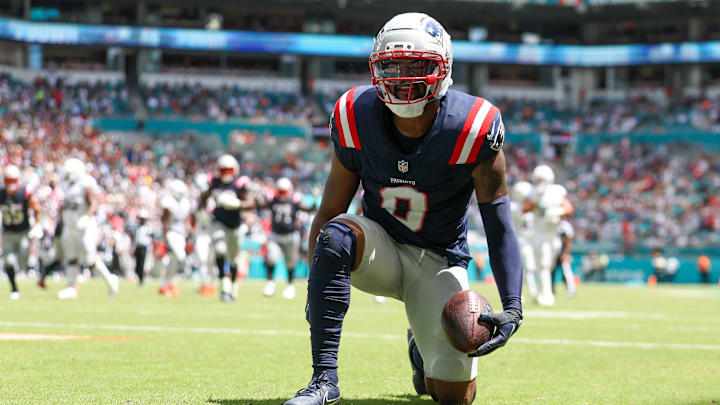 New England Patriots wide receiver Kayshon Boutte (9) races after scoring a touchdown against the Miami Dolphins in the first quarter at Hard Rock Stadium. New England Patriots wide receiver Kayshon Boutte (9) races after scoring a touchdown against the Miami Dolphins in the first quarter at Hard Rock Stadium.