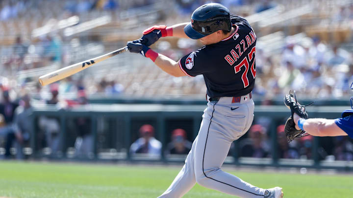 Feb 24, 2026: Cleveland Guardians second baseman Travis Bazzana hits a three run home run against the Los Angeles Dodgers during a spring training game at Camelback Ranch-Glendale. 