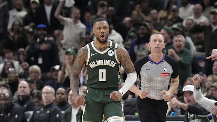 Apr 25, 2025; Milwaukee, Wisconsin, USA; Milwaukee Bucks guard Damian Lillard (0) reacts after making a basket against the Indiana Pacers in the second half during game three of first round for the 2024 NBA Playoffs at Fiserv Forum. Mandatory Credit: Michael McLoone-Imagn Images