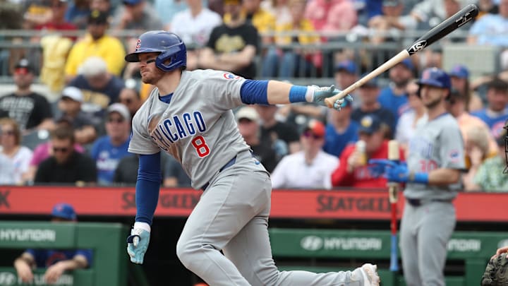Pittsburgh, Pennsylvania, USA; Chicago Cubs left fielder Ian Happ (8) hits a single against the Pittsburgh Pirates during the seventh inning at PNC Park. Pittsburgh, Pennsylvania, USA; Chicago Cubs left fielder Ian Happ (8) hits a single against the Pittsburgh Pirates during the seventh inning at PNC Park.