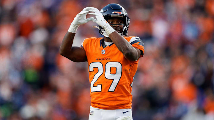 Dec 15, 2024; Denver, Colorado, USA; Denver Broncos cornerback Ja'Quan McMillian (29) gestures in the third quarter against the Indianapolis Colts at Empower Field at Mile High. Mandatory Credit: Isaiah J. Downing-Imagn Images