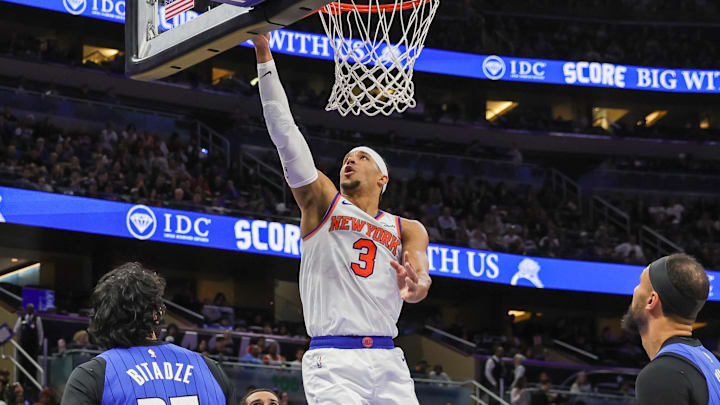 Dec 27, 2024; Orlando, Florida, USA; New York Knicks guard Josh Hart (3) lays up during the second quarter against the Orlando Magic at Kia Center. Mandatory Credit: Mike Watters-Imagn Images