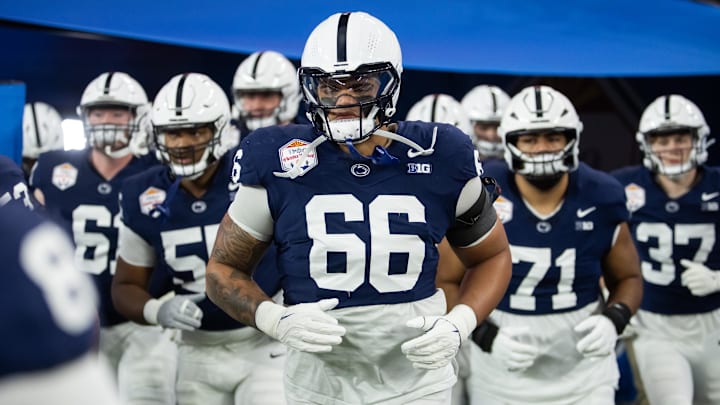 Dec 31, 2024; Glendale, AZ, USA; Penn State Nittany Lions offensive lineman Drew Shelton (66) against the Boise State Broncos during the Fiesta Bowl at State Farm Stadium. Mandatory Credit: Mark J. Rebilas-Imagn Images