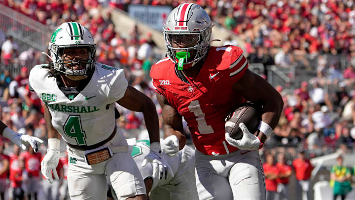 Sept. 21, 2024; Columbus, Ohio, USA;
Ohio State Buckeyes running back Quinshon Judkins (1) outruns Marshall Thundering Herd defensive back Jadarius Green-McKnight (4) during the second half of an NCAA Division I football game at Ohio Stadium on Saturday.