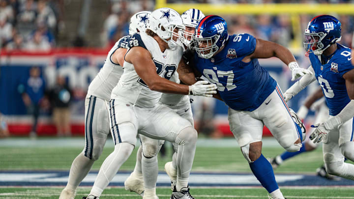 Sep 26, 2024; East Rutherford, NJ, US; New York Giants defensive tackle Dexter Lawrence II (97) rushes off the line of scrimmage at MetLife Stadium.  