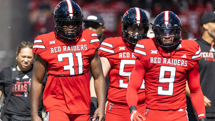 Oct 18, 2025; Tempe, Arizona, USA; Texas Tech Red Raiders linebacker David Bailey (31) and Romello Height (9) against the Arizona State Sun Devils at Mountain America Stadium. Mandatory Credit: Mark J. Rebilas-Imagn Images