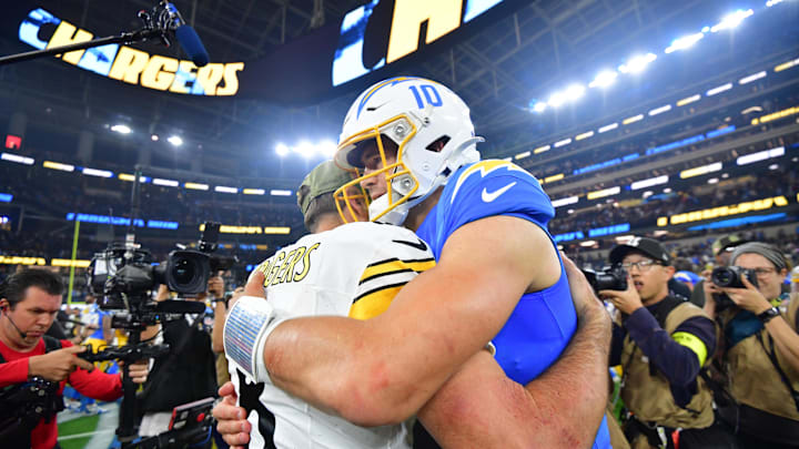 Nov 9, 2025; Inglewood, California, USA; Pittsburgh Steelers quarterback Aaron Rodgers (8) hugs Los Angeles Chargers quarterback Justin Herbert (10) after the game at SoFi Stadium. Mandatory Credit: Gary A. Vasquez-Imagn Images