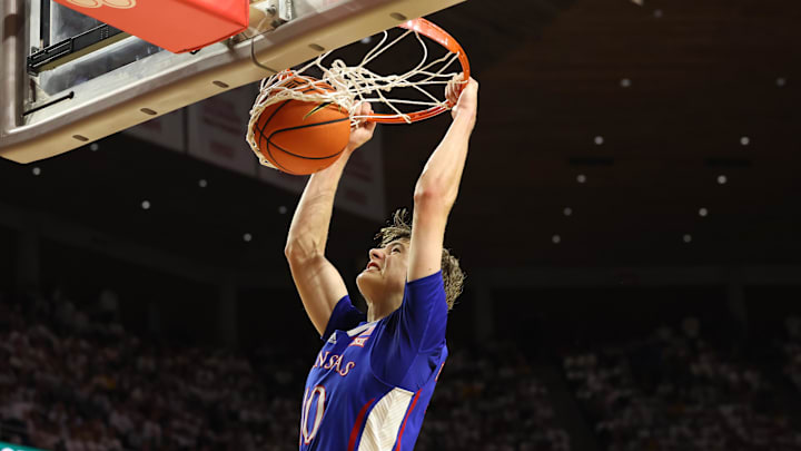 Feb 4, 2023; Ames, Iowa, USA; Kansas Jayhawks guard Johnny Furphy (10) dunks against Iowa State.