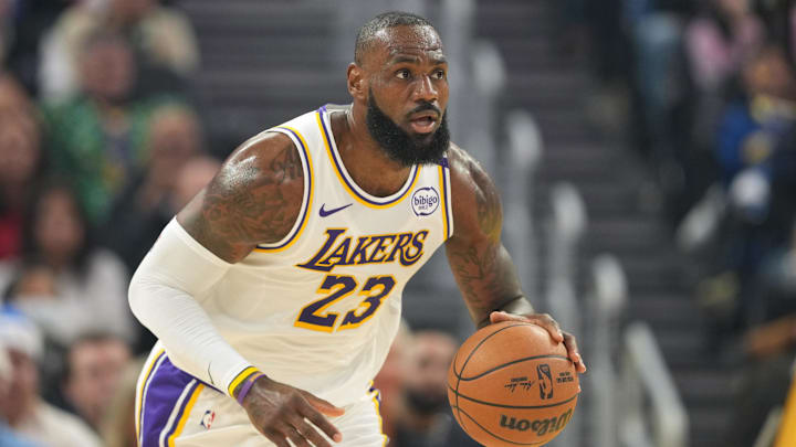 Los Angeles Lakers forward LeBron James dribbles the ball.