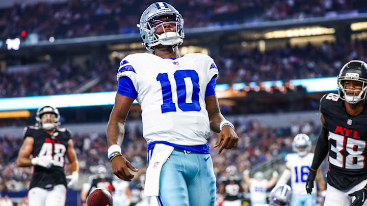 Dallas Cowboys QB Joe Milton III reacts after scoring a touchdown during the first quarter against the Atlanta Falcons.